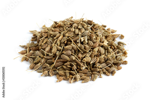 Pile of of dried anise seed (aniseed) isolated on white background