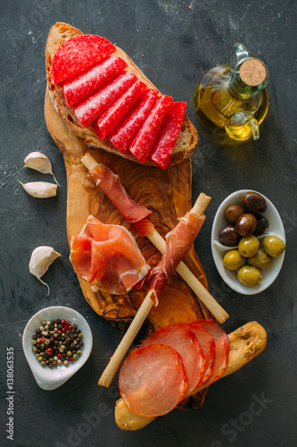 Board with snacks and appetizer photo