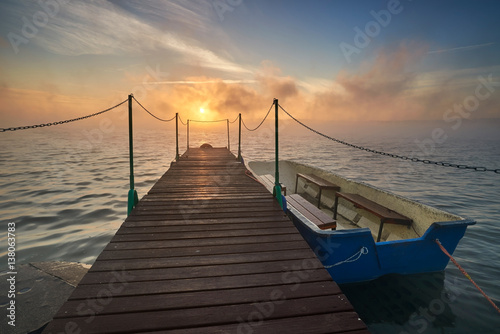 boat on the lake at beautiful sunrise, bridge, harbor