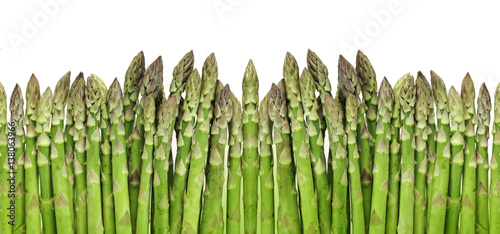 green raw asparagus isolated on white background photo