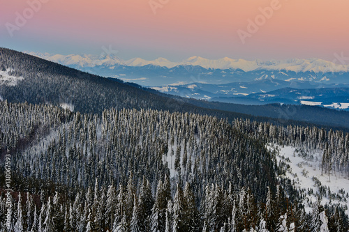 Majestic sunset in the winter mountains landscape. Beskids, Rysianka, view from Tatra