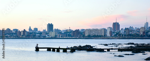 Sunset scene of beach and skyline at background in Montevideo, Uruguay