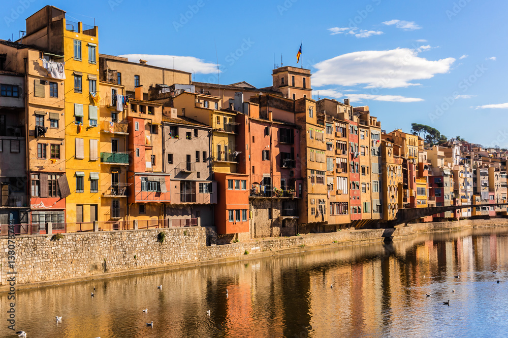 Colorful houses of Girona reflecting in Onyar River. Spain.