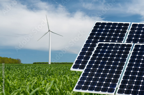 Photo collage of solar panels against the crops background - conceptual image