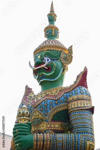 standing giant guard statue in The Emerald Buddha temple in Bangkok  Thailand