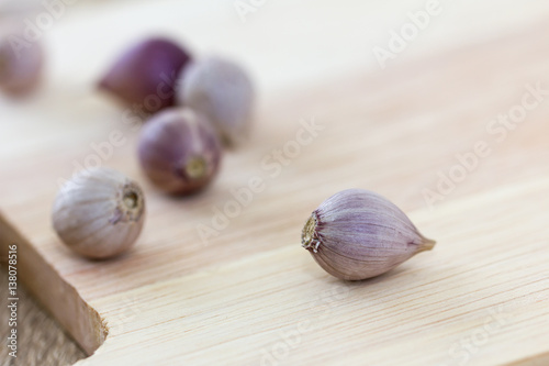 Garlic on wood cutting board