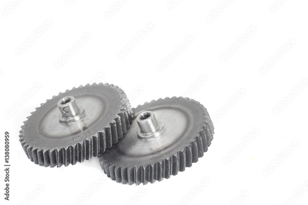Metal gears on white background.