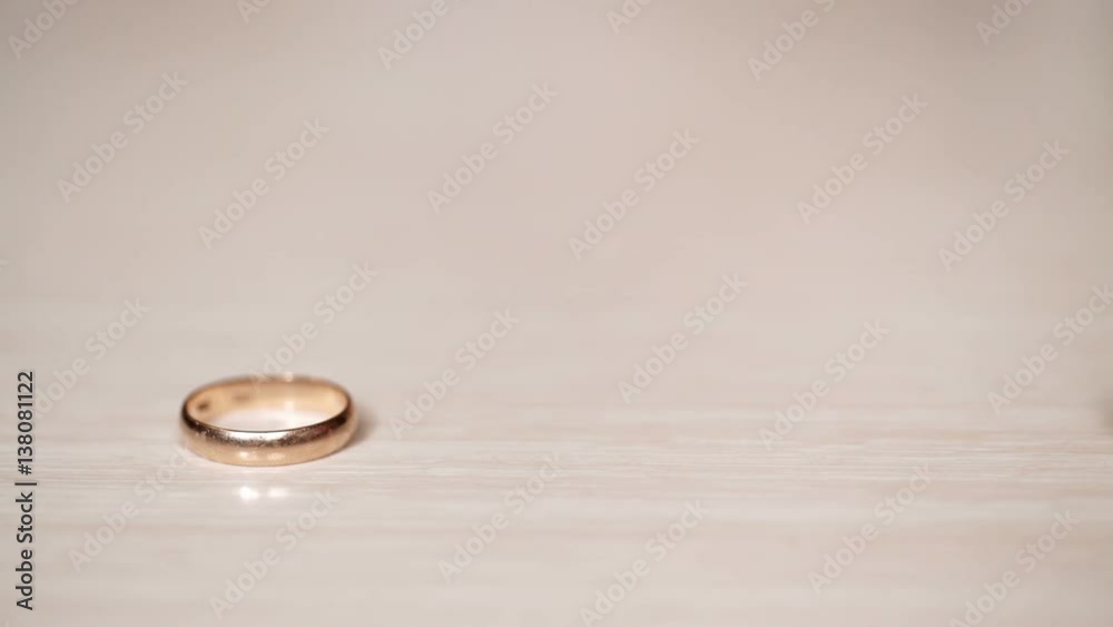 Wedding golden rings rolls one to another Wedding golden rings rolls one to another