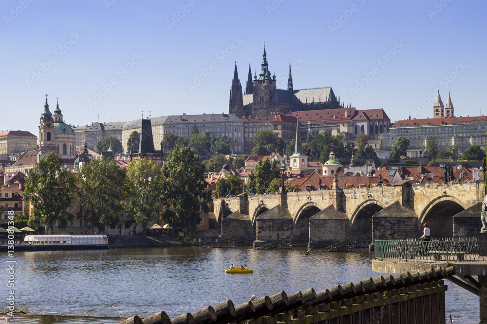 View of Prague castle and Charles Bridge with river Vlatva
