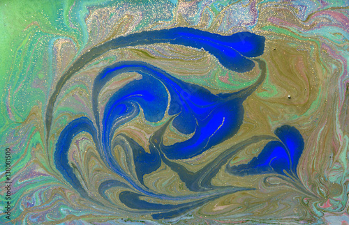 Green and blue liquid texture. Hand drawn marbling background. Ink marble abstract pattern