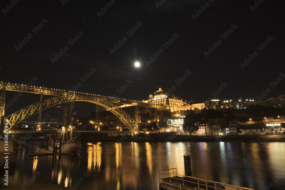 Dom Luis I Bridge illuminated at night. Oporto, Portugal