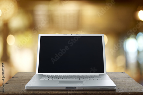 Aluminum Laptop on a wooden table