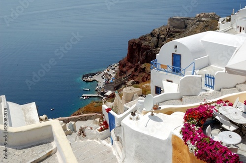 Santorini - the volcano among the Cyclades  Aegean sea. Island s capital  Fira  which is situated on the edge of a cliff. Known for distinctive architecture in white and blue colours