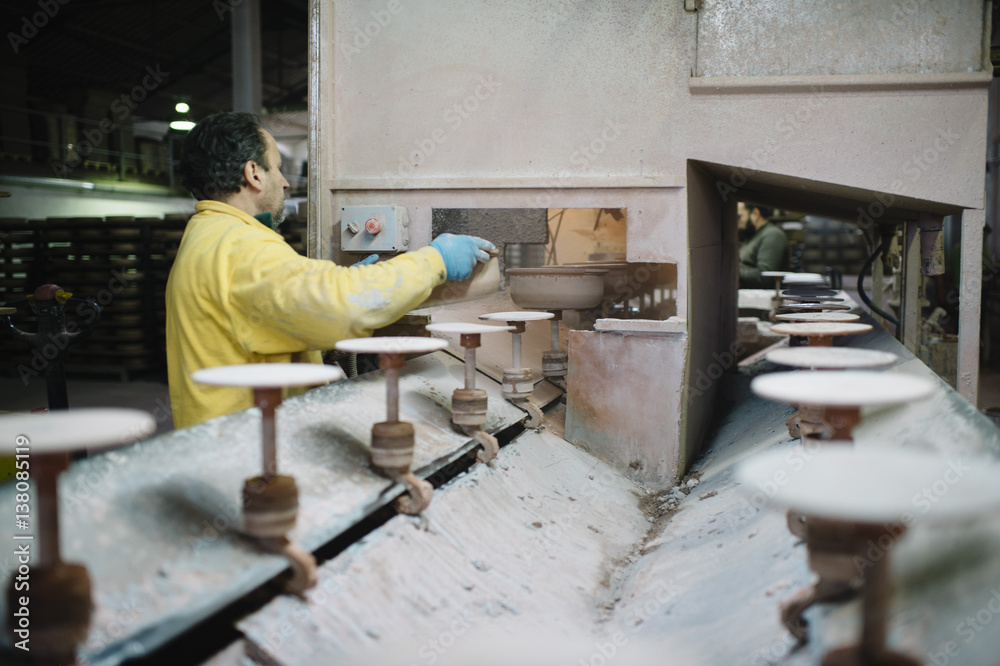 man that works in the factory of pottery man that works in the factory of pottery