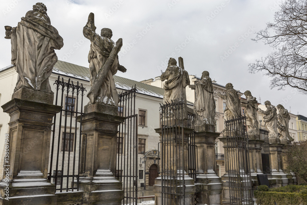 Statues of Saints Peter and Paul Church fence. Krakow, Poland.