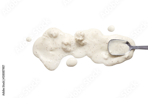splashes and spilled blue cheese with a spoon. isolated on white background. flat lay, top view