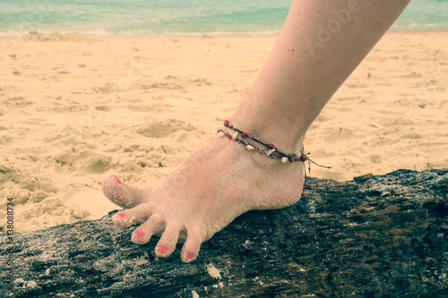 Leg on the stone beach