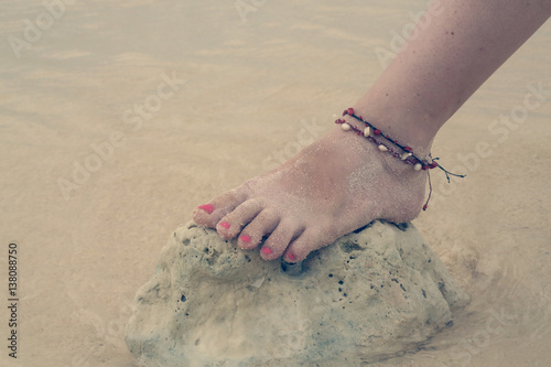 Leg on the stone beach