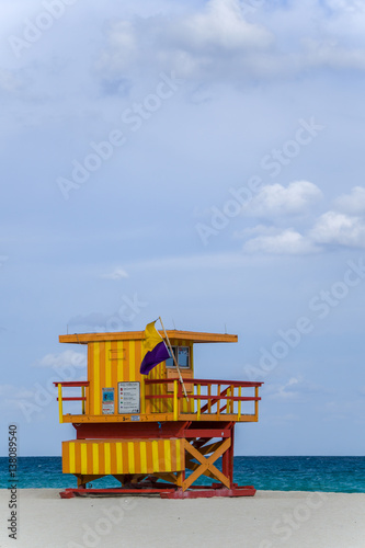 A colorful lifeguard station sits on Miami Beach, Florida on a sunny summer day © Kevin