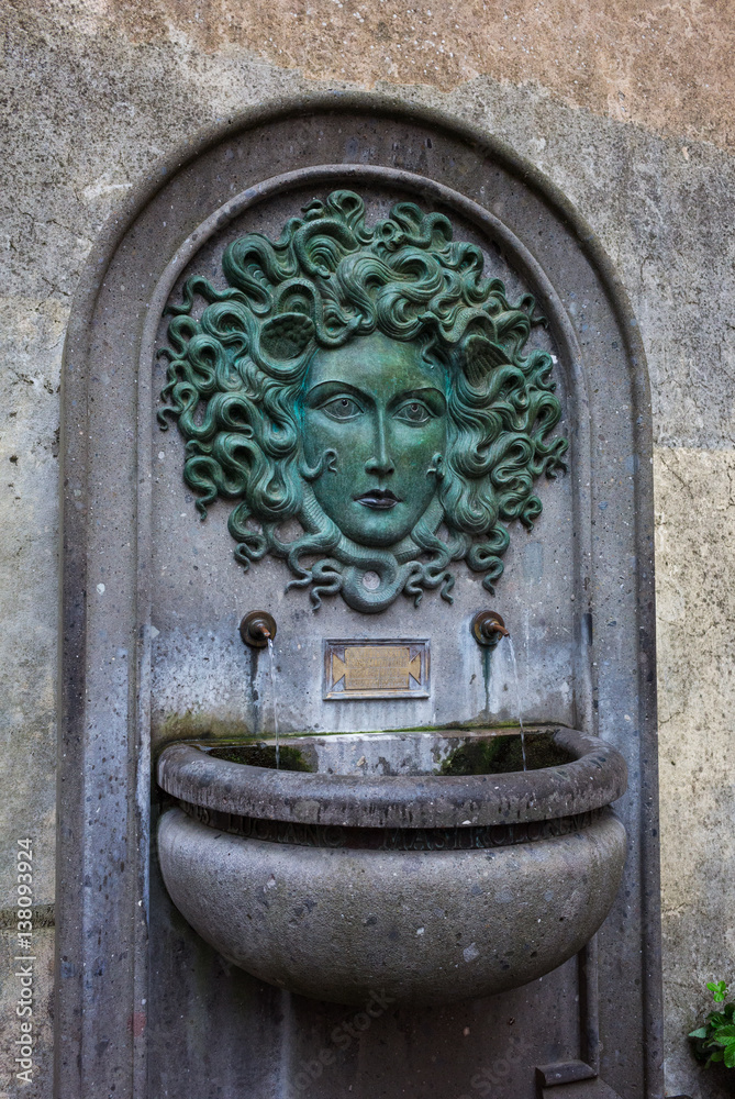 NEMI, ROMA, ITALY-SEPTEMBER 10, 2016. Beautiful fountain Medusa in Nemi, Italy.