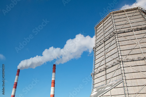 Industrial  ecology and environmental pollution. The smoke from the chimney of the industrial plant. 