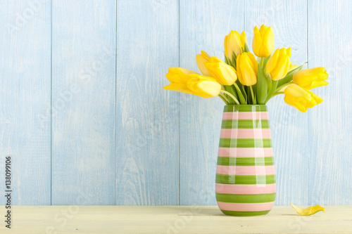 Yellow tulips in a jug