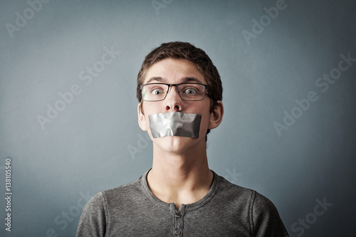teen with tape sealed mouth
