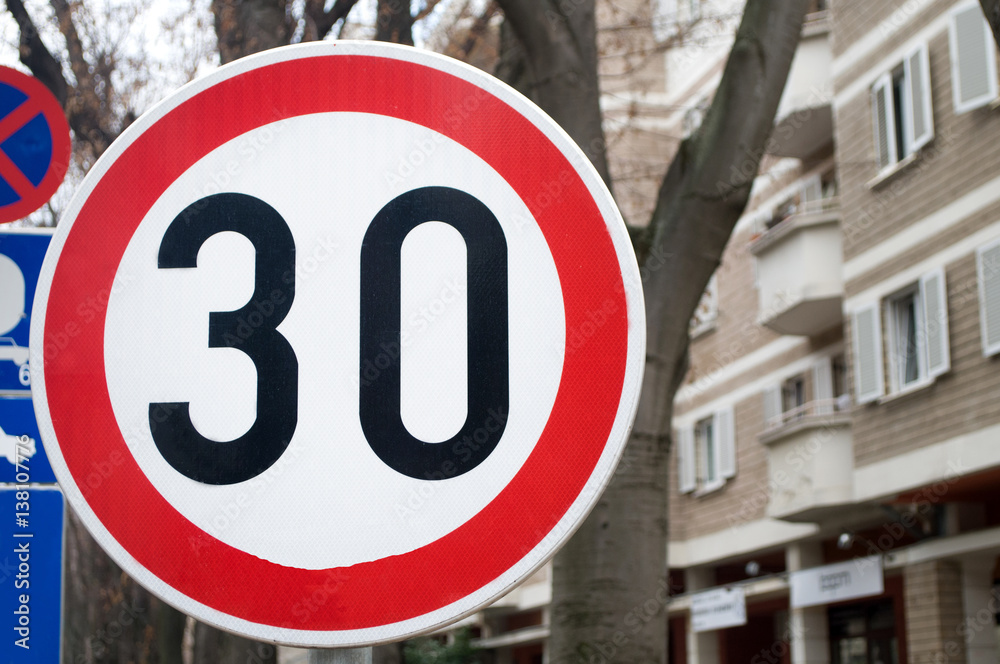 Traffic sign indicating that the speed limit is 30 km / h, Novi Sad, Serbia Traffic sign indicating that the speed limit is 30 km / h, Novi Sad, Serbia