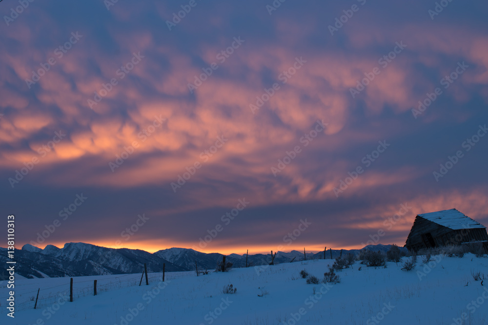 A glowing sunrise starts the day in Star Valley, Wyoming.
