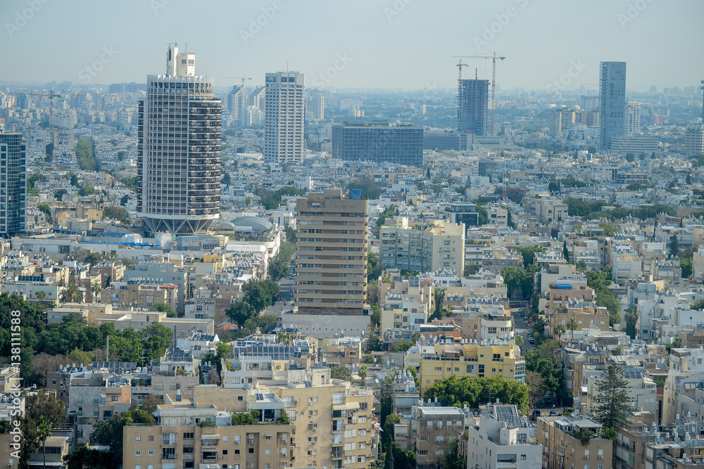Panoramic view on roofs of  Tel-Aviv on the modern buildings background