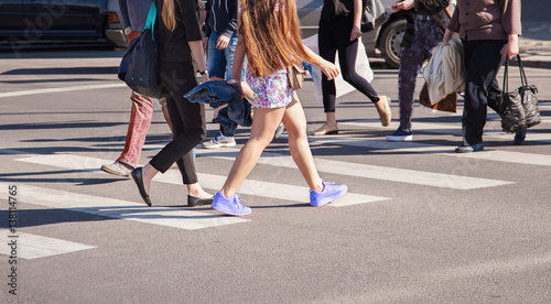 pedestrians walking on a crosswalk