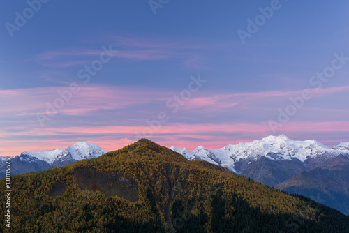 Fototapeta Naklejka Na Ścianę i Meble -  Autumn landscape with snowy mountain peaks