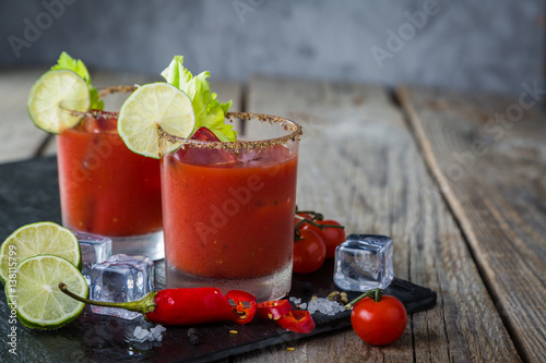 Fotografie Bloody mary cocktail and ingredients
