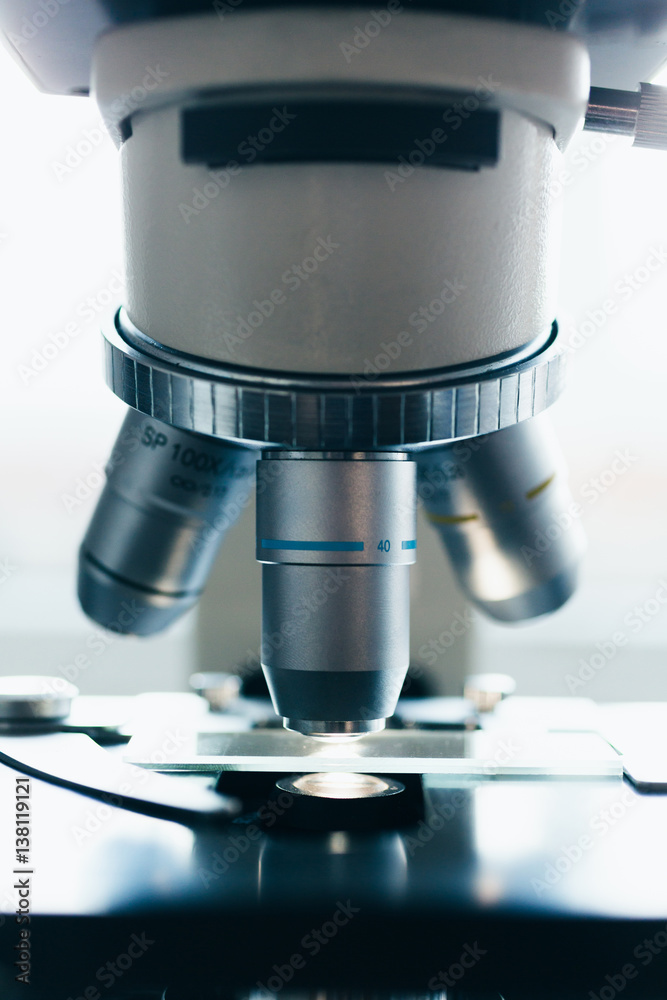 Modern microscope in the laboratory. Closeup shot. Modern microscope in the laboratory. Closeup shot.