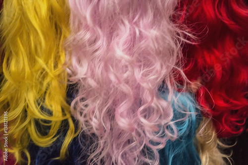 Rainbow of female long wavy hair. Art object of hairdressing.