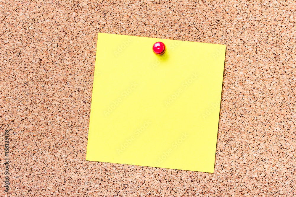 Yellow note pined to cork board. Empty reminder card. Yellow note pined to cork board. Empty reminder card.