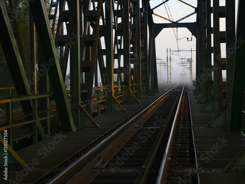The train comes to a  bridge.