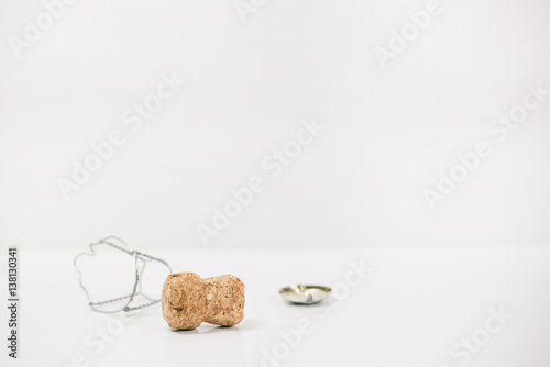 Εκτύπωση καμβά the end of the holiday (cork from champagne isolated on white background)