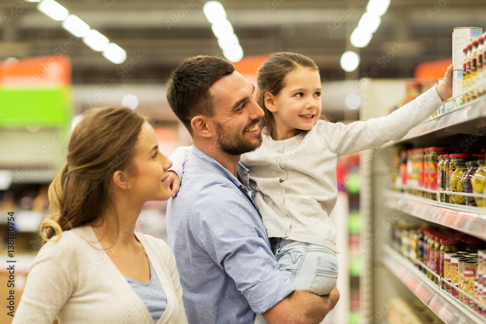 © Syda Productions - happy family buying food at grocery store