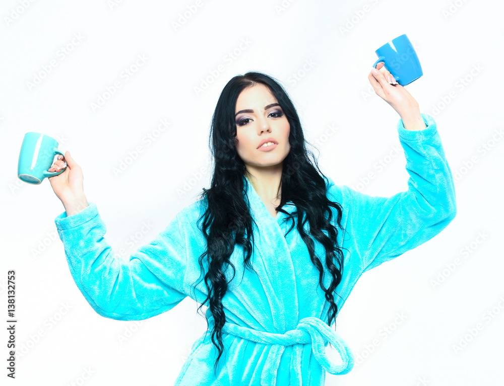 sexy girl posing in turquoise velour bathrobe with cup sexy girl posing in turquoise velour bathrobe with cup