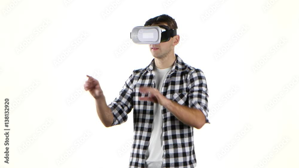 Man works with files in virtual reality glasses. Hand movement Man works with files in virtual reality glasses. Hand movement