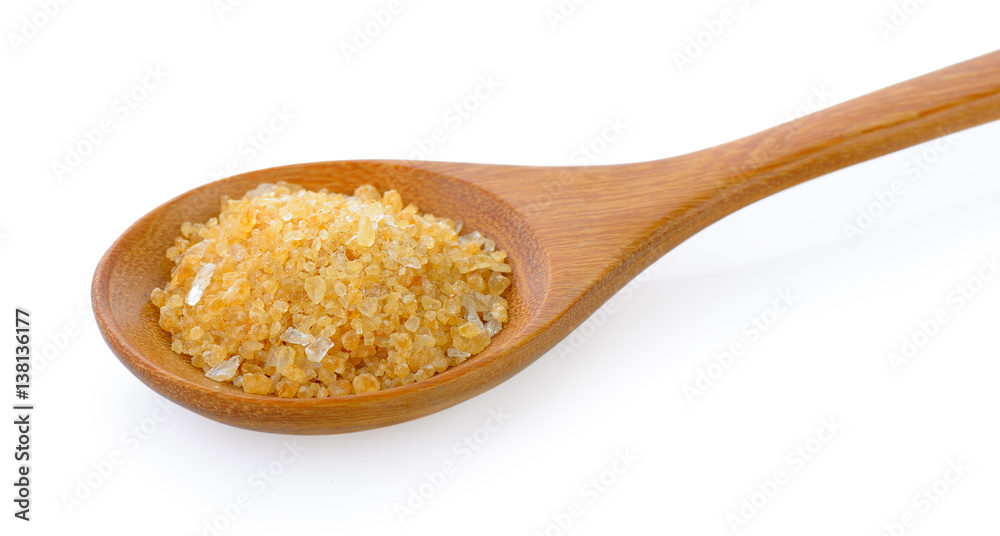 Sugar for coffee in wood spoon on white background