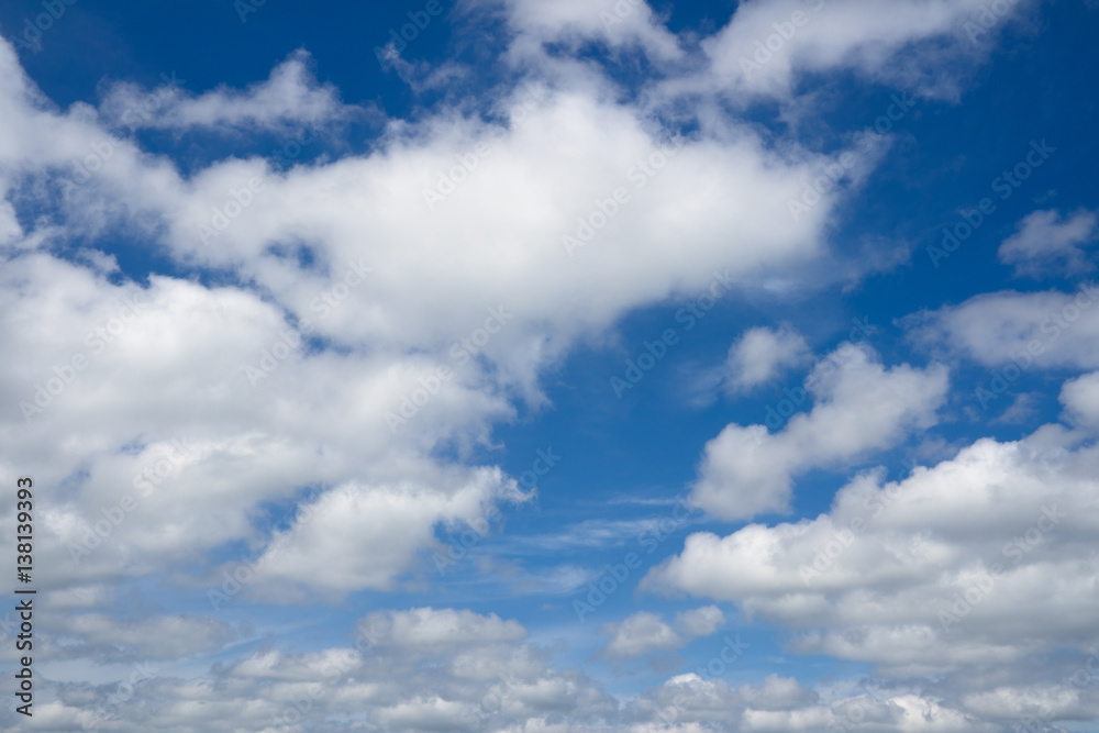 White clouds flying against blue sky. Blue sky with clouds over horizon. White clouds flying against blue sky. Blue sky with clouds over horizon.