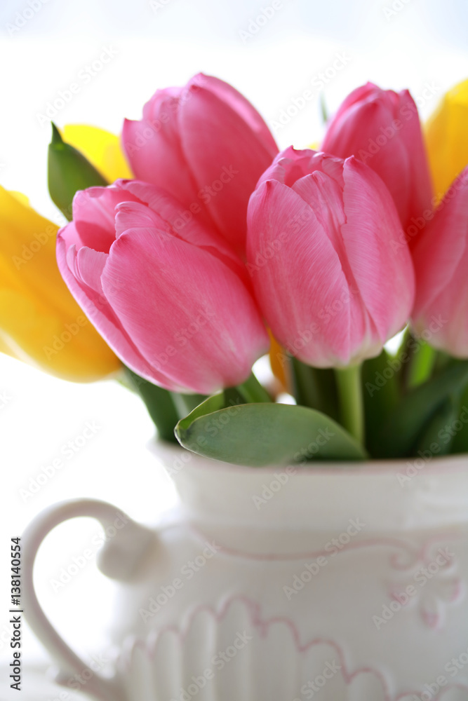 Fototapeta premium チューリップ Pink tulip flowers in white vase close up