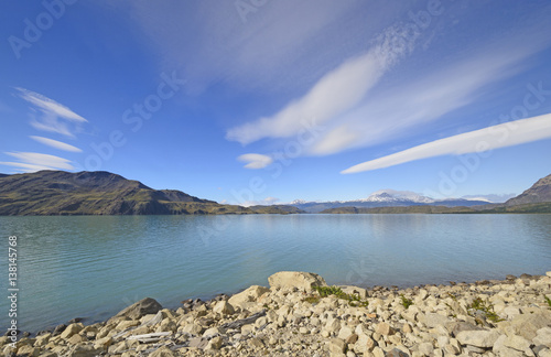 Lenticular Clouds Over A Glacial Lake