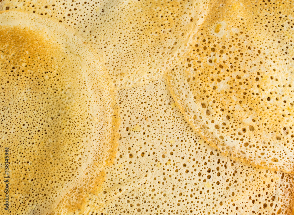 Thin Pancakes on a Wooden Background Top View. Fresh Homemade Crepes Thin Pancakes on a Wooden Background Top View. Fresh Homemade Crepes
