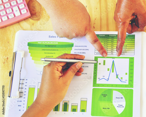 Wallpaper Mural Business woman investment consultant analyzing company seal report balance sheet statement working with documents. Concept picture of economy, market, office,money and tax. Torontodigital.ca