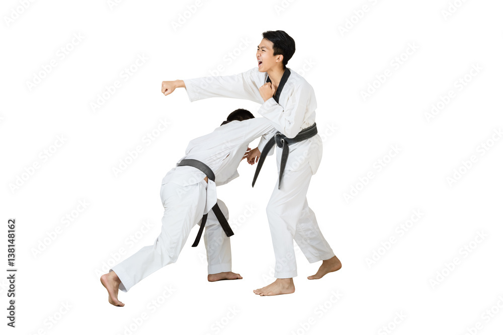 Portrait of two asian taekwondo professional with black belt fighting. Isolated full length on white background with copy space and clipping path Portrait of two asian taekwondo professional with black belt fighting. Isolated full length on white background with copy space and clipping path
