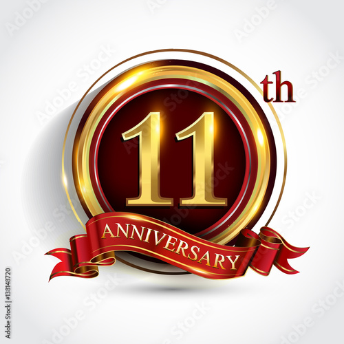 11th anniversary logo with ring and ribbon golden colored isolated on white background, vector design for greeting card and invitation card.