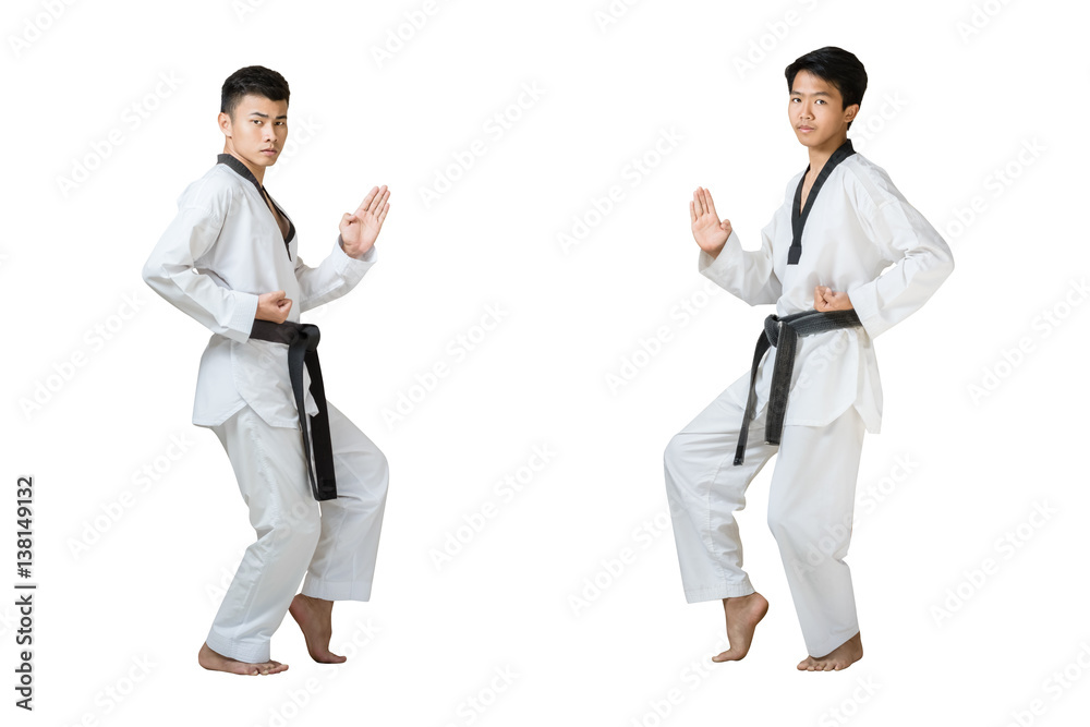 Portrait of two young handsome asian man with taekwondo black belt preparing for fight. Isolated on white background with copy space Portrait of two young handsome asian man with taekwondo black belt preparing for fight. Isolated on white background with copy space
